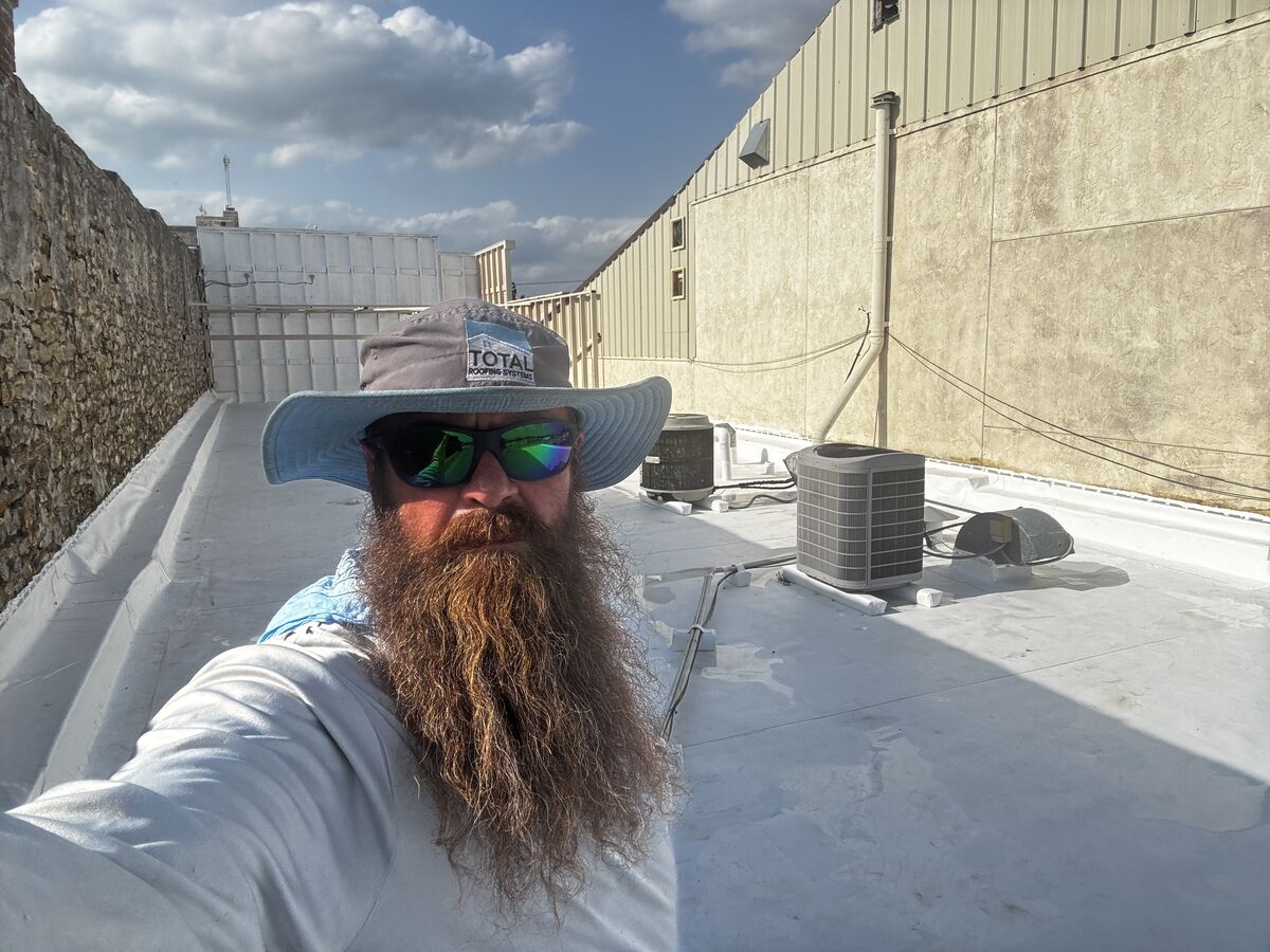 Eric Waller — Total Roofing Systems on the job